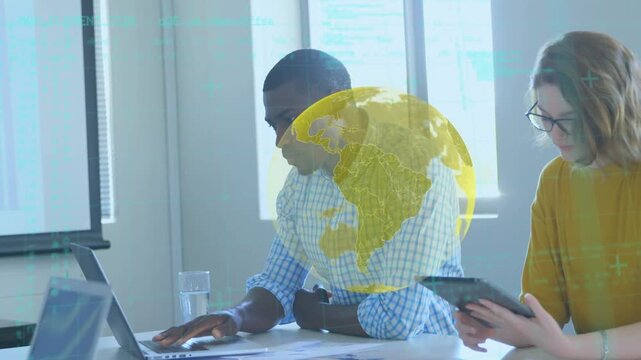 Animation of globe over diverse coworkers in office