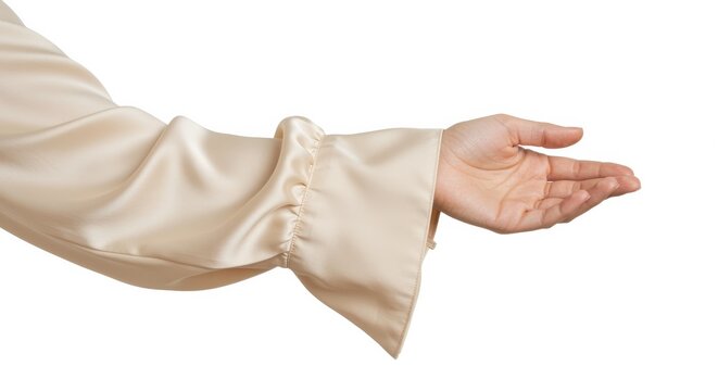 champagne colored silk charmeuse polished female arm isolated on white with flowing cuff