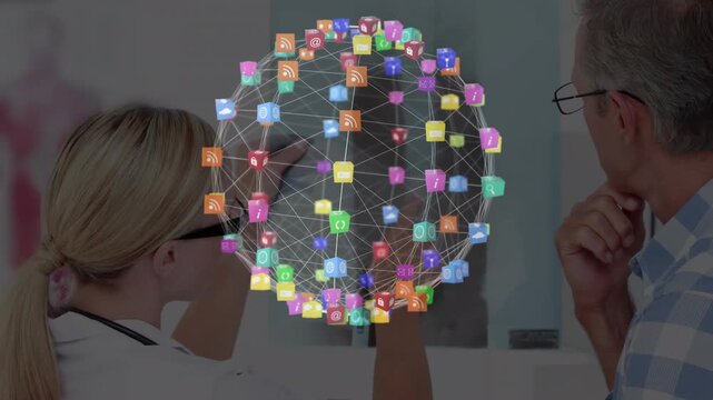 Animation of media icons over caucasian female doctor with patient and xray