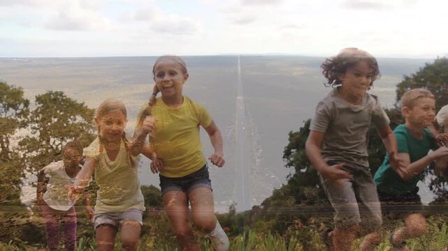 On signal six children pushing off crouch, sprinting past camera, clearing to empty slope, racing