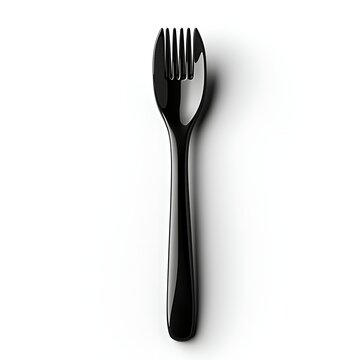 Black Spork: A minimalist top-down shot of a black spork on a surface, highlighting its sleek design and the combined functionality of a fork and spoon