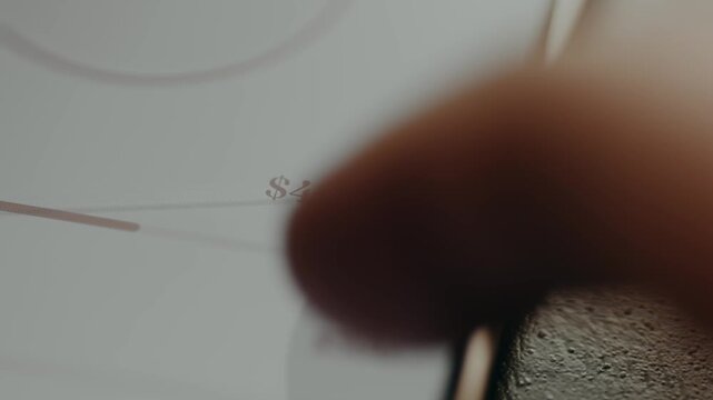 Person using a slider to set a value of 500K USD