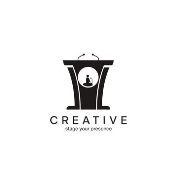 Black podium with microphone and creative logo.
