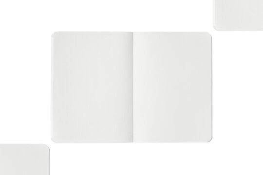 Three blank white notebooks arranged diagonally