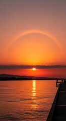 Obraz premium Sunset Over Water with a Halo Effect and Dock.