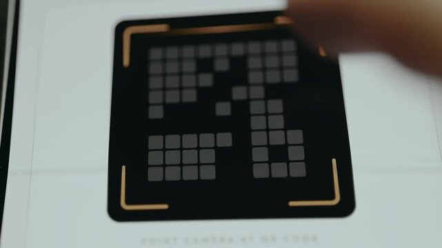 User taps the viewfinder to scan the QR code