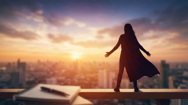 Silhouette of a woman in a cape standing on a rooftop ledge with a notebook and pen in the foreground, overlooking a city skyline at sunset