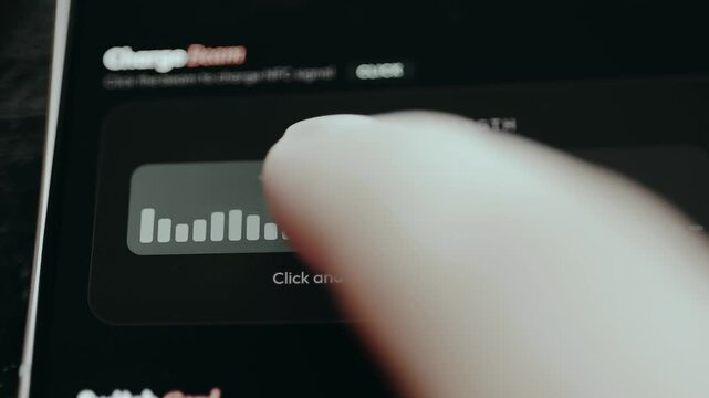 User holds the finger on screen to charge the NFC signal