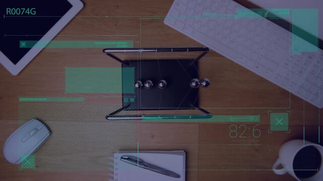 Animation of statistics and data processing over desk with computer and office items