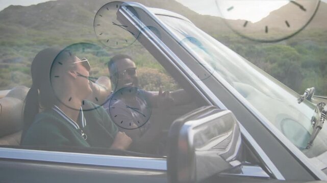 Vertical video: Open-top drive starting, clocks drifting as driver steering and passenger cheering
