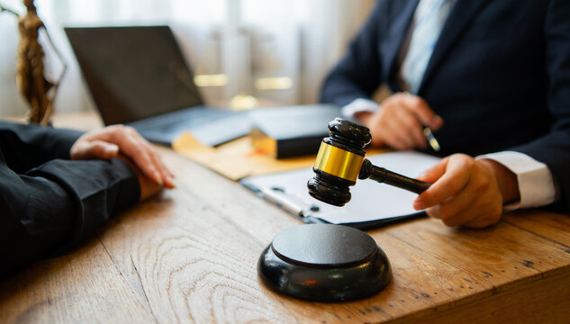 Professional lawyers provide consultation to clients in their office, discussing legal documents, contracts, justice, law, and court matters, offering advice, support, and leading to successful 