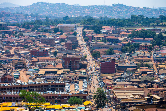 Elevated cityscape with a busy road running through Kampala