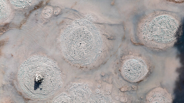 Aerial view of otherworldly, textured formations, like ancient carvings etched into the earth, Waiotapu Thermal Wonderland, Rotorua, Waikato Region, New Zealand.