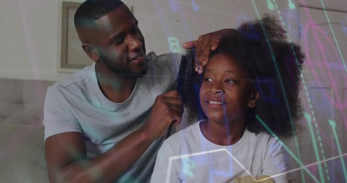 Dad placing wide tooth brush combing roots to ends for haircare while circuit overlay moving across