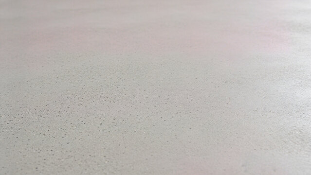 Seamless minimalist pale gray micro-cement texture background for architecture