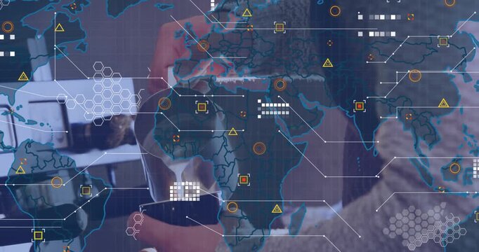 Animation of data processing and world map over mid section of male barista preparing coffee at cafe