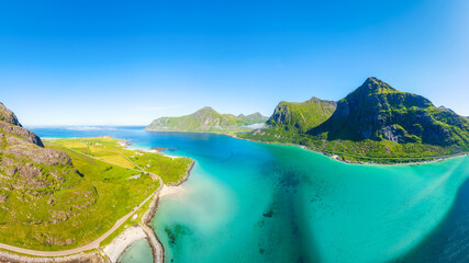 Aerial drone view of fjords in Lofoten islands, Norway. Panoramic view. Scenic arctic landscape with high peaks, blue ocean and northern nature. © biletskiyevgeniy