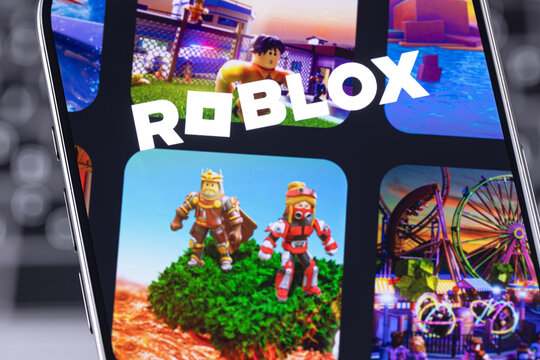 Roblox logo mobile app on a screen smartphone iPhone closeup. Roblox is an online gaming platform and game creation system. Batumi, Georgia - March 19, 2026