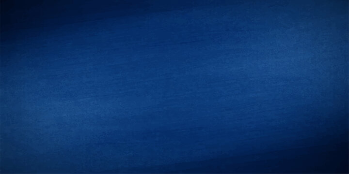 A dark blue denim fabric texture background features a rough cotton textile pattern with a vintage grunge surface design perfect for a fashion cloth backdrop or wallpaper