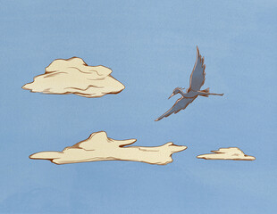 Fototapeta premium heron flies in the sky among the clouds