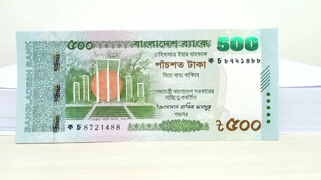 Stacks of Bangladeshi taka banknotes. Bangladeshi 500 Taka banknote. 