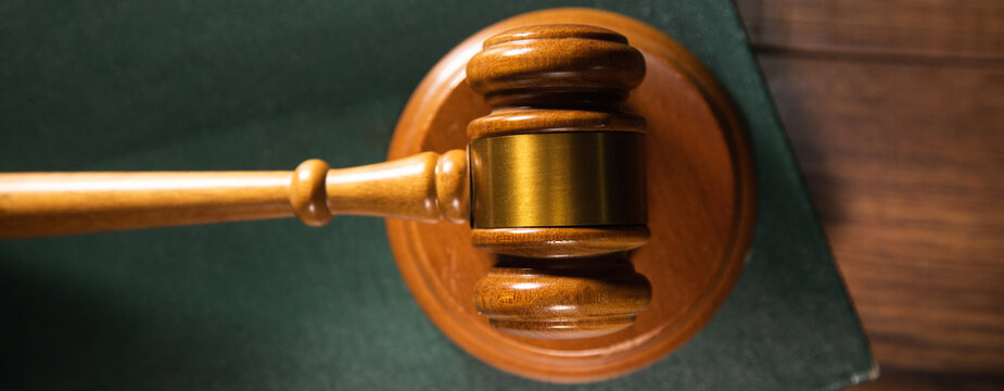 judge with book on table