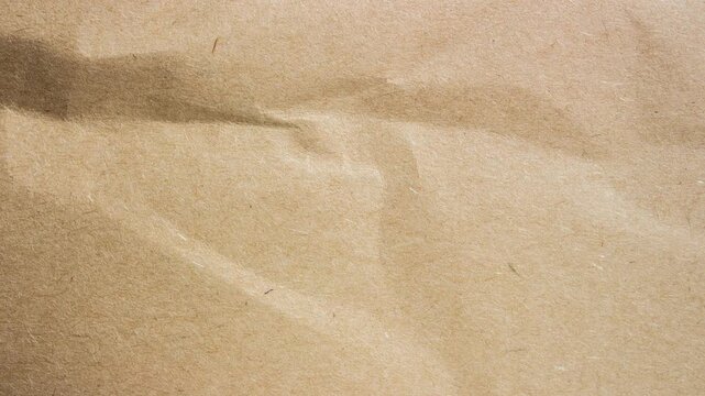 Crumpled Kraft Paper Texture Background with Wrinkles and Natural Vintage Surface Detail