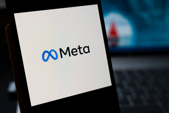 Warsaw, Poland - April 10, 2026: Close-up of the Meta logo displayed on a smartphone screen, symbolizing innovation and technology in the digital age, with a blurred background of modern devices.