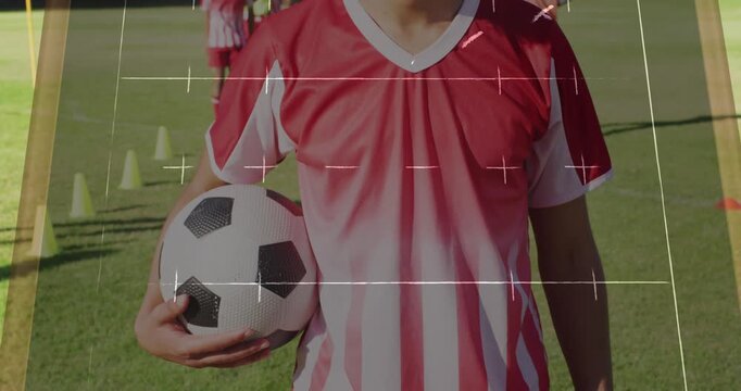 Animation of game plans over diverse football players at stadium