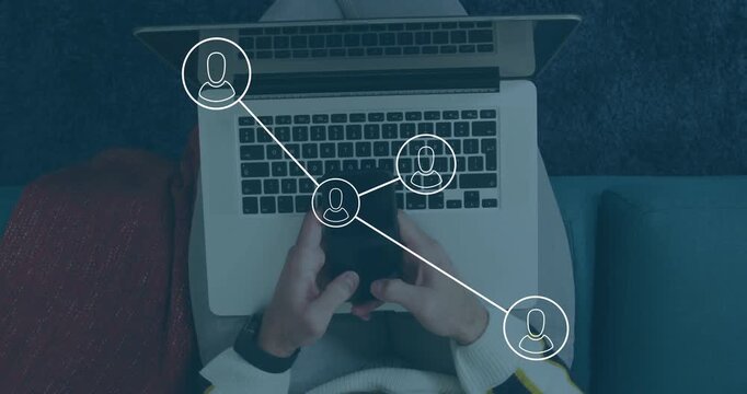 Man tapping smartphone, laptop on lap, expanding network nodes into avatars for communication