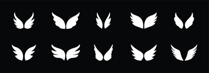 Fototapeta premium White wings silhouette vector set. Wings set is ideal for logo, emblem, badge design. Flying winged frame. Biker logo stencil stamp isolated on black background.