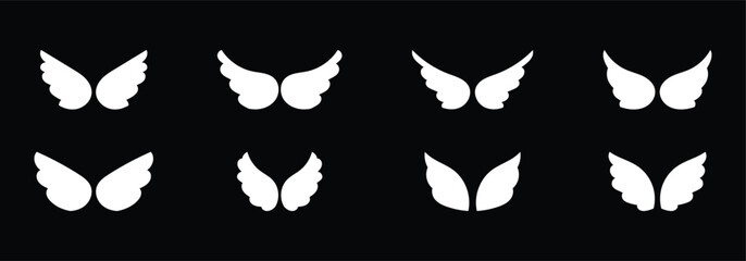 Wings icons set. Simple set of wings badges. Wings black icons vector set. Modern minimalistic design isolated on black background. © Snap Smith