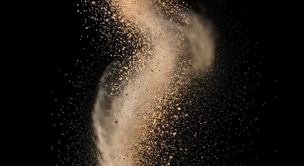 Dynamic explosion of tan powder and sand particles with motion blur against a black background © Fatima Jawadia