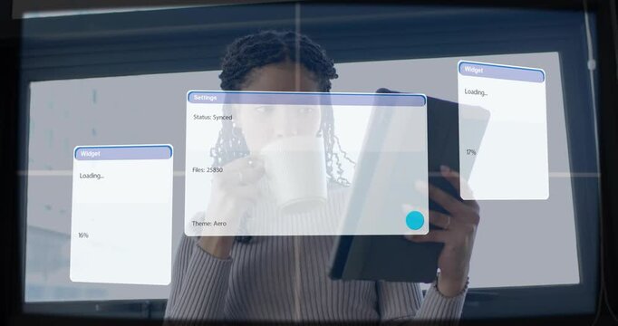 Vertical video: Woman tapping tablet, sipping mug by bright window, starting tech sync updating UI