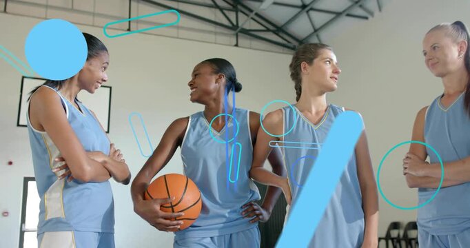 Four women basketball players holding ball, sports graphics appearing, obscuring then revealing