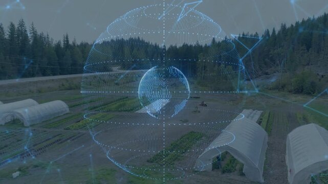 Blue dotted 3D globe expanding and rotating over rural farm, rings forming after data feed starts