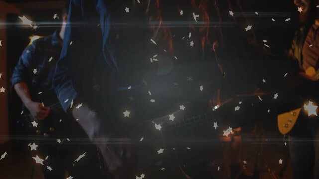 Camera pulling forward singer leaning into mic singing for fans, guitars playing, stars floating