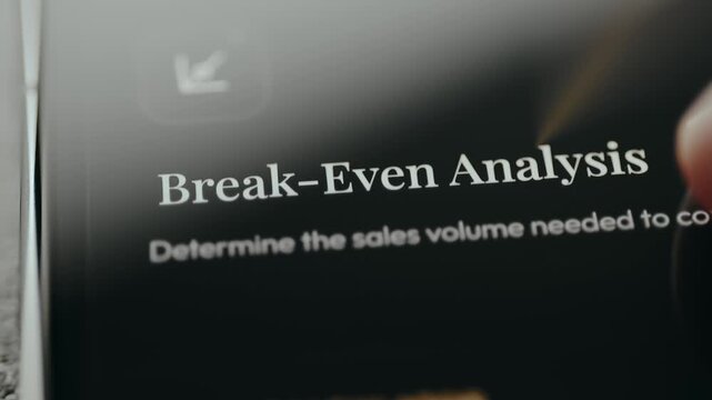 Break-even analysis term and explanation on device screen