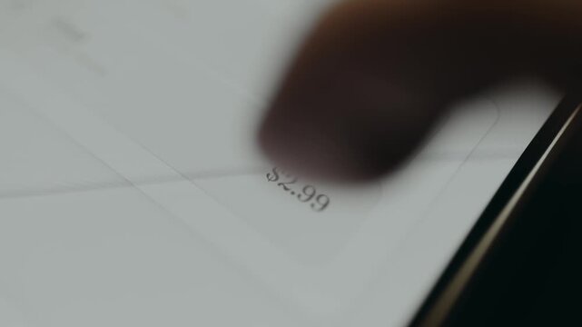 Person swipes left on mobile phone screen to decline all the pending requests for payment
