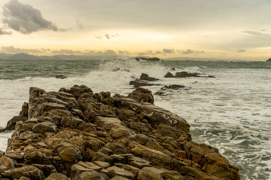 Rocky coastline at Punta Carnero Algeciras Cadiz with crashing waves