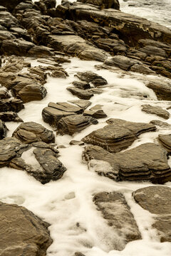 Rocky coastline at Punta Carnero Algeciras Cadiz with crashing waves