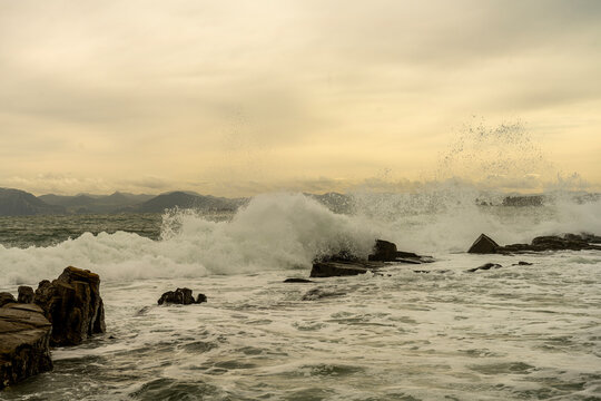 Rocky coastline at Punta Carnero Algeciras Cadiz with crashing waves