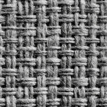 Seamless black and white texture of slub cotton fabric with uneven threads.