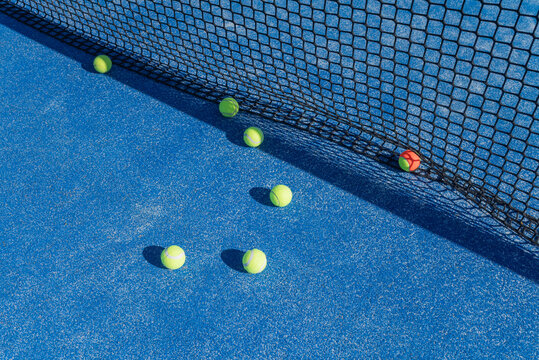 Vibrant Blue Padel Court with Yellow Balls The Concept of Healthy Lifestyle
