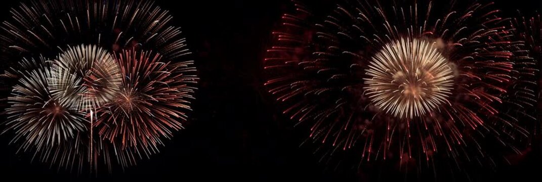 Fireworks - patriotic fourth of july firecracker display exploding in the night sky with red, white, and blue sparkles