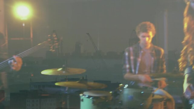 Vertical video: Cam pull revealing singer singing drummer tapping snare skyline overlay for music