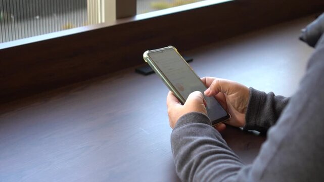 Using Mobile phones in hands looking posts social media chatting call