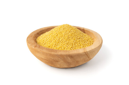 Raw millet grains pile isolated. Little yellow cereal, natural foxtail small seeds
