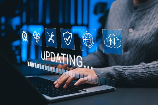 System Updating and Software Maintenance Concept. Woman using laptop with update progress bar, cloud, security system icons representing software improvement, data synchronization, digital maintenance