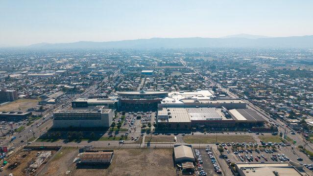 TALCA, CHILE - MARCH 27, 2026: Aerial view of Mall Plaza Maule and surrounding commercial district in the city center.